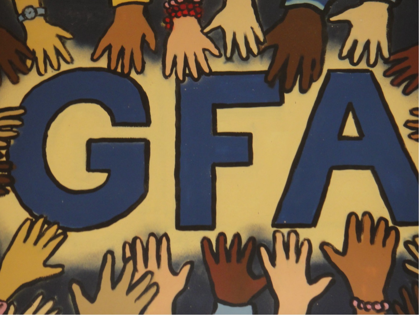 Bild mit vielen Händen die um die Abkürzung GFA einen Kreis bilden